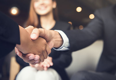 two people shaking hands