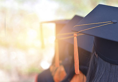 line of graduation caps